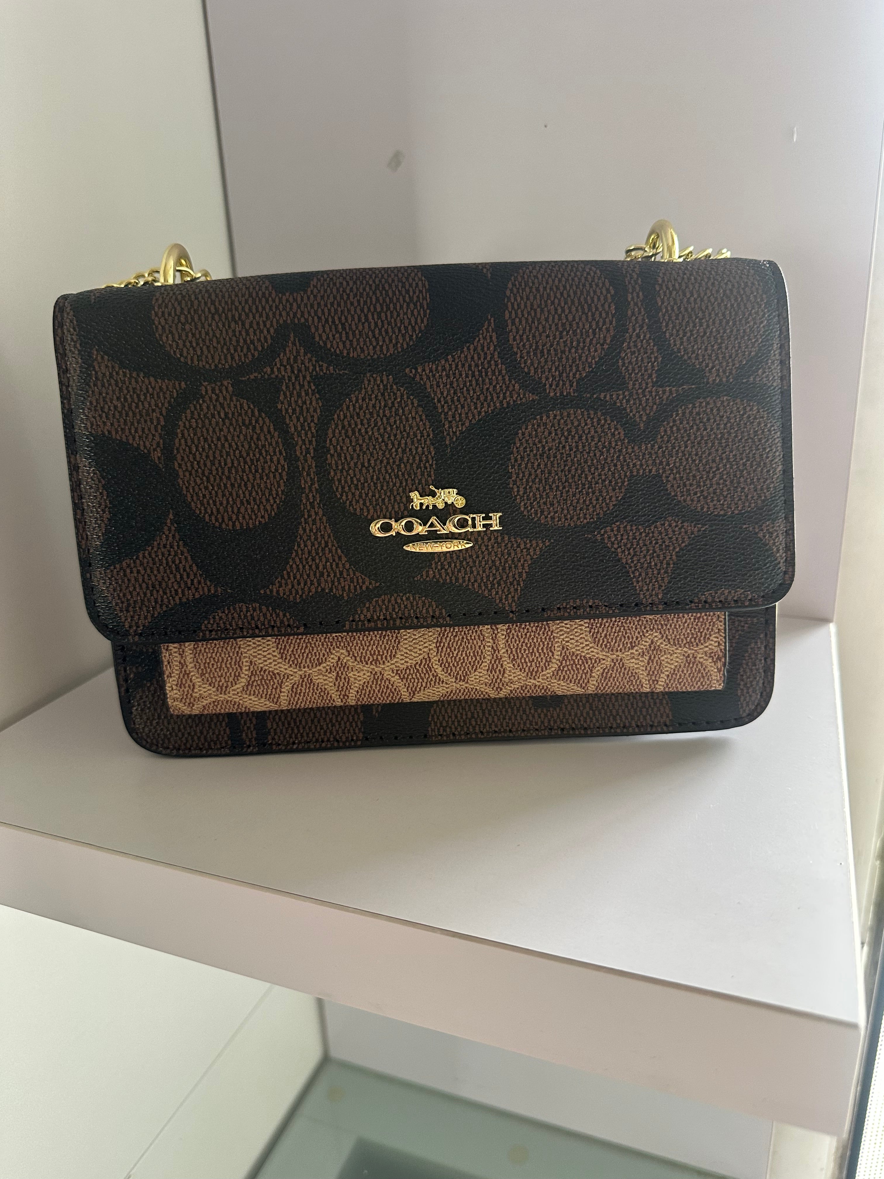 Cartera Coach con Bolsa Cubre Polvo